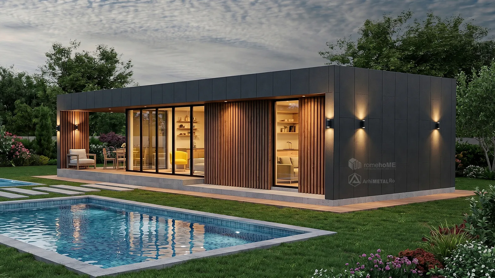 Casa Gina seara, cu luminile aprinse, de lângă piscină