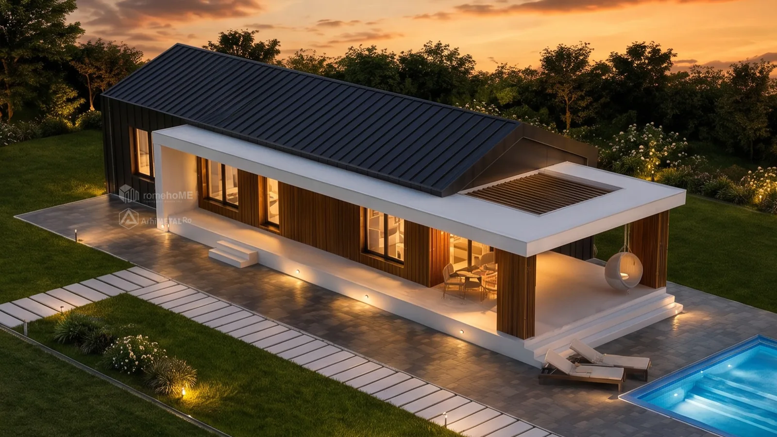 Casa Viviana seara, cu luminile aprinse și piscina în prim-plan